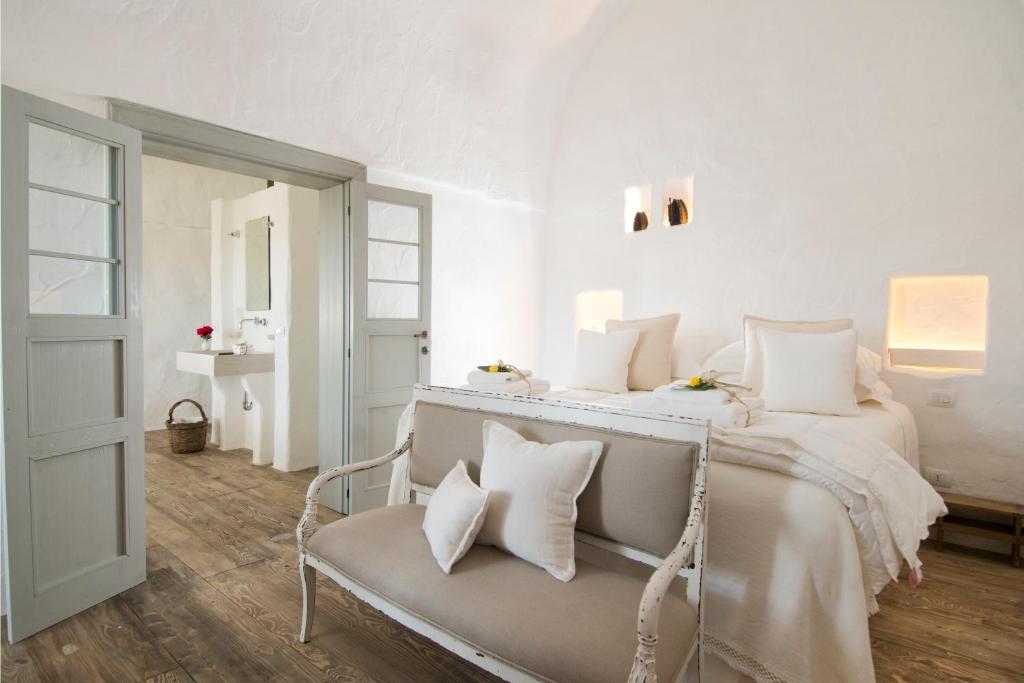 Postel nebo postele na pokoji v ubytování Masseria Le Torri