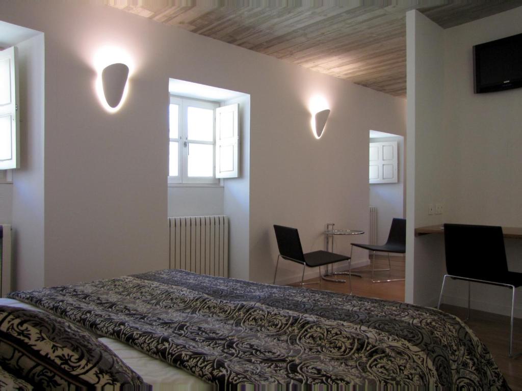 TV a/nebo společenská místnost v ubytování Hotel Roncesvalles