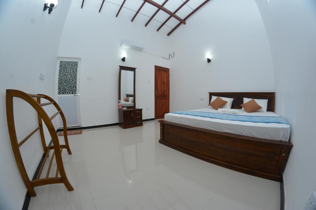 Postel nebo postele na pokoji v ubytování Reshani Guest House