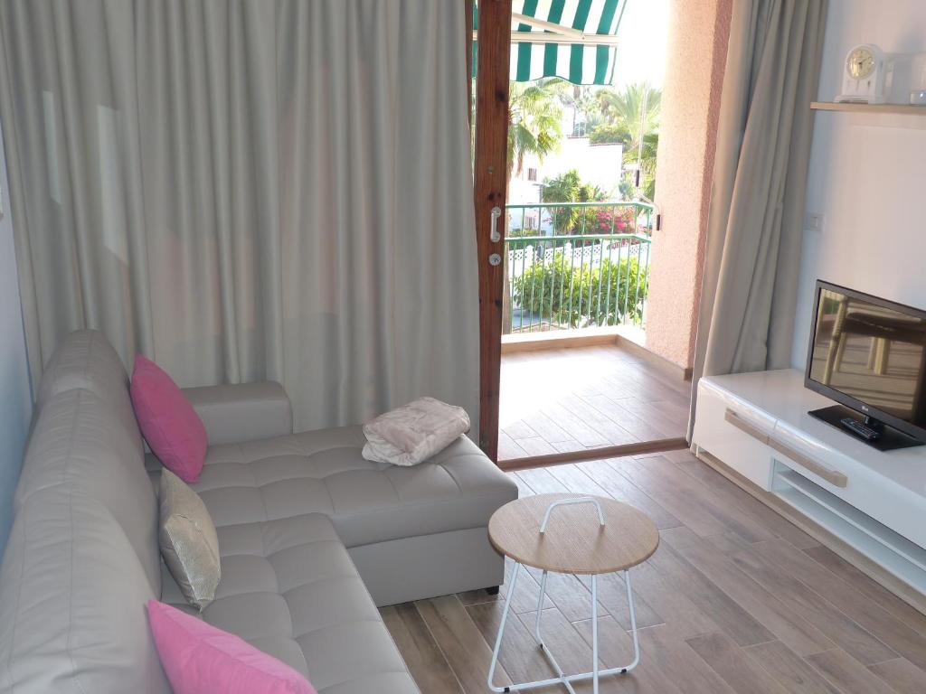 A seating area at Ocean View Apartment By Suncanarias