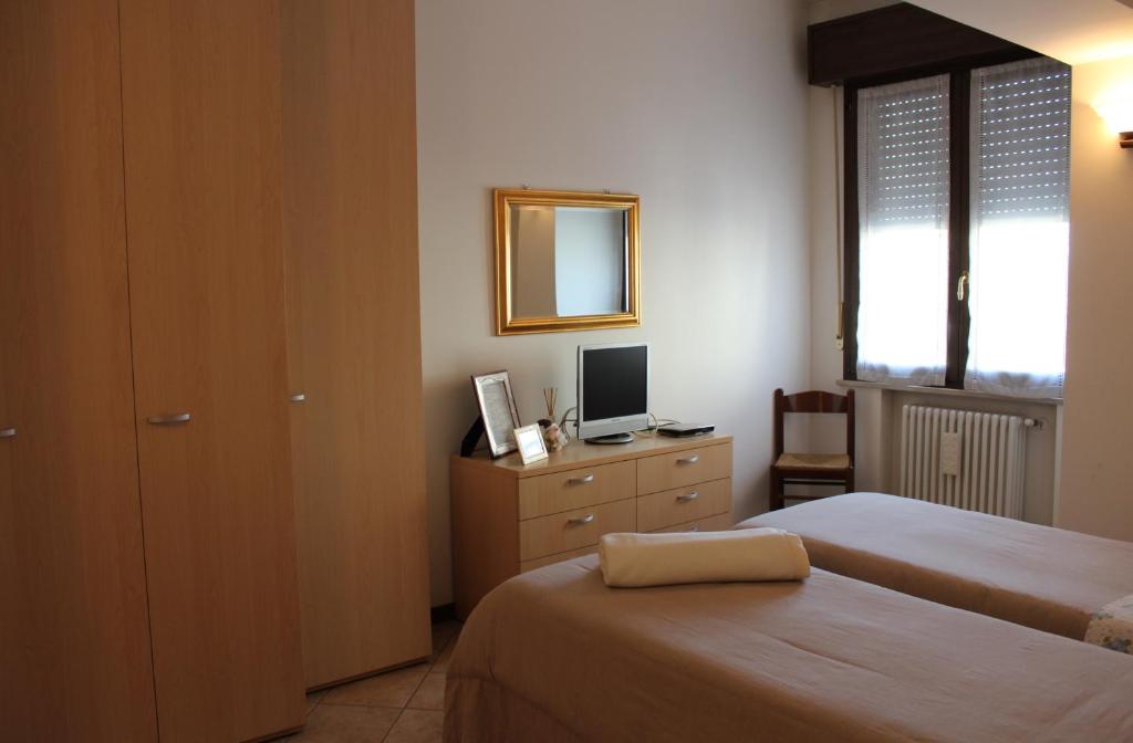 Postel nebo postele na pokoji v ubytování B. & B. NABUCCO