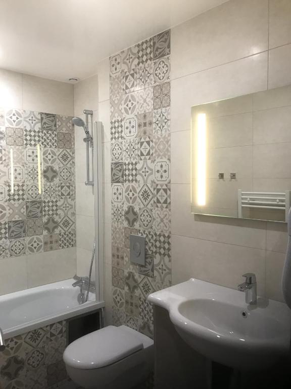 Koupelna v ubytování Hotel Le Cercle
