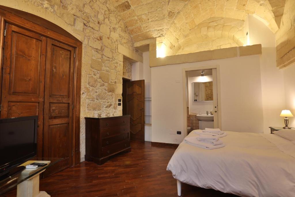 Postel nebo postele na pokoji v ubytování Chiesa Greca Suites - Lecce Selection