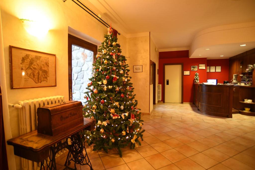 Fotografia z galérie ubytovania Albergo Bucaneve v destinácii Pievepelago
