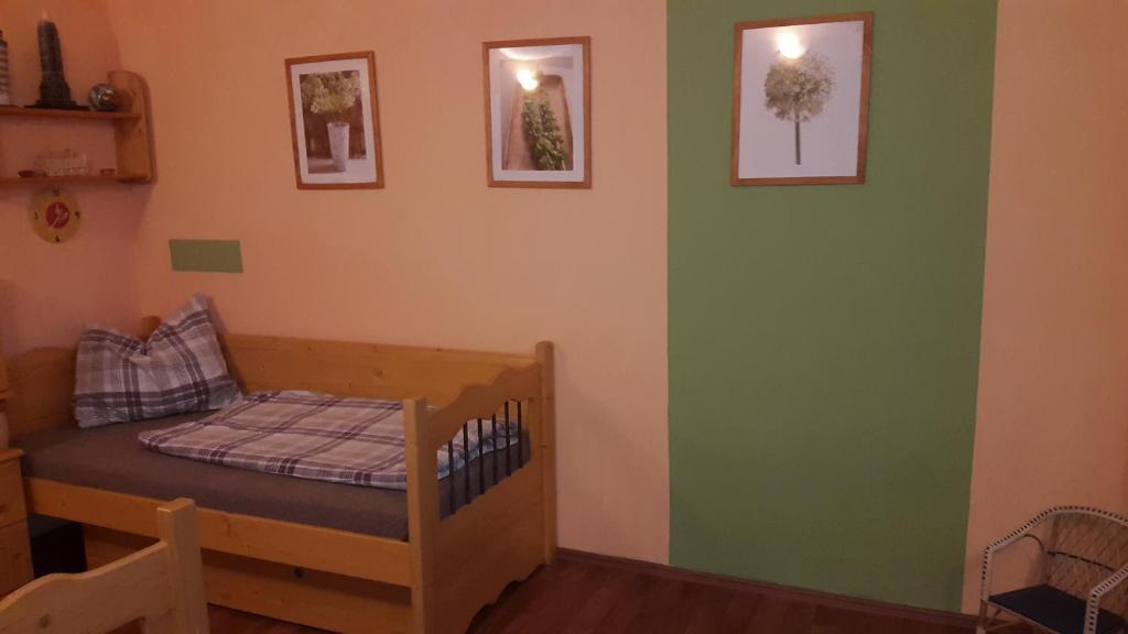 Postel nebo postele na pokoji v ubytování Apartmány Liška