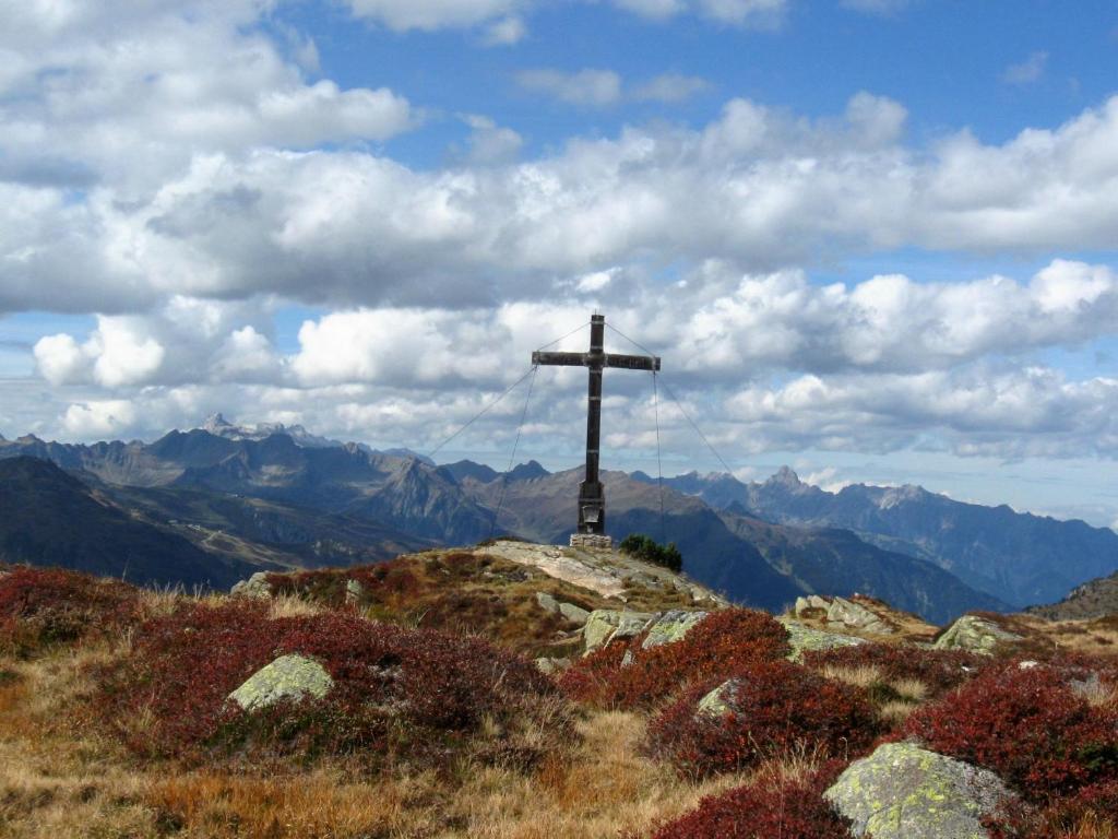 a cross on the top of a mountain at Haus Klinger in Gaschurn