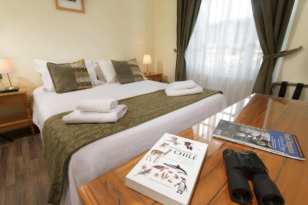 Postel nebo postele na pokoji v ubytování Hotel Carpa Manzano