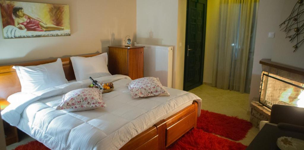 Postel nebo postele na pokoji v ubytování Guesthouse Liogerma