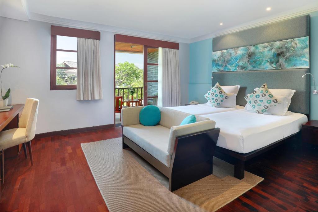 Postel nebo postele na pokoji v ubytování Novotel Bali Nusa Dua