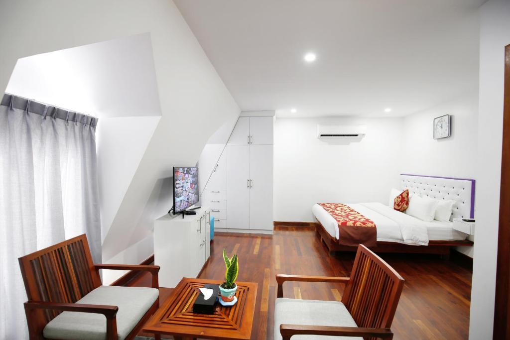 Postel nebo postele na pokoji v ubytování Zita Angkor Hotel