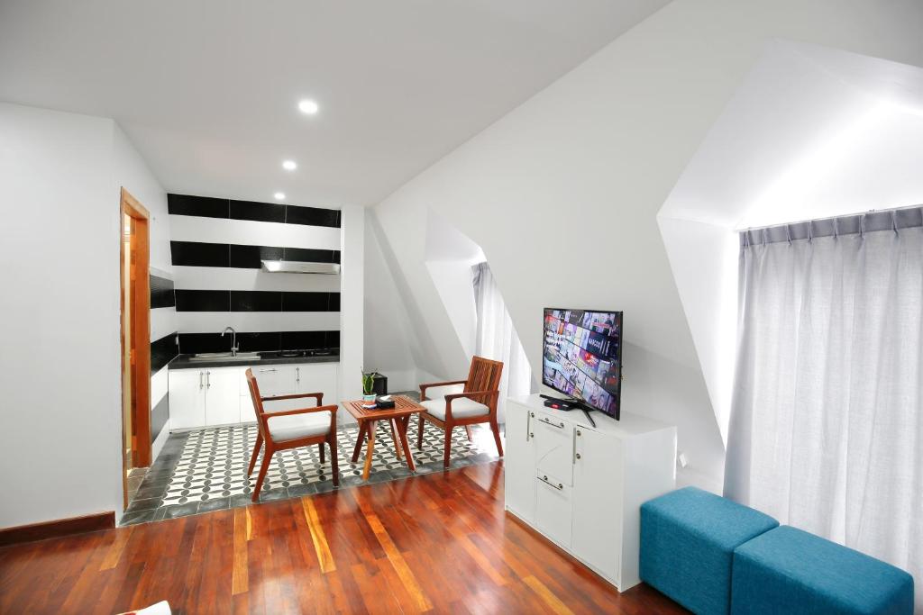 TV a/nebo společenská místnost v ubytování Zita Angkor Hotel