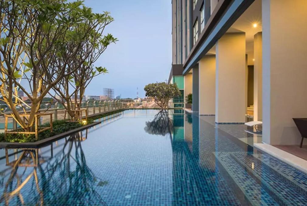 a swimming pool in the middle of a building at 4 Bedroom Luxury Suite at Baan Kieng Fah in Hua Hin