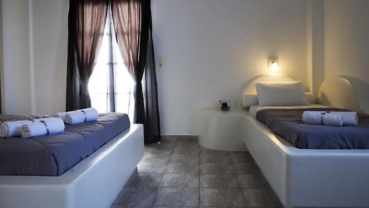 Postel nebo postele na pokoji v ubytování Philippion Boutique Hotel