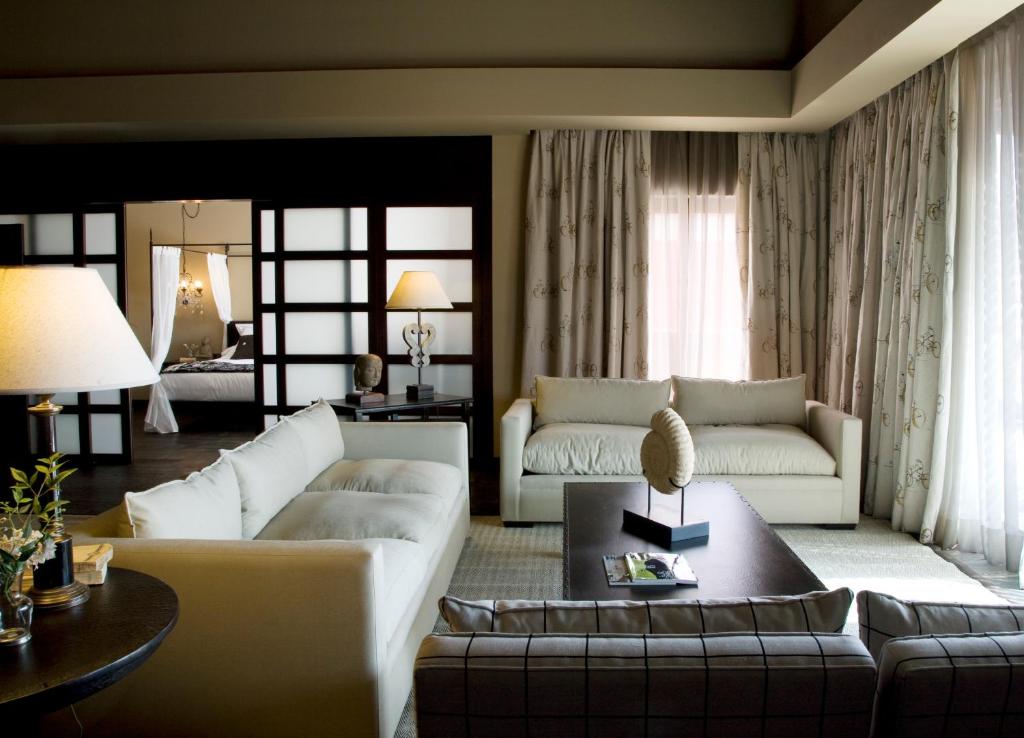 Posezení v ubytování Asia Gardens Hotel & Thai Spa, a Royal Hideaway Hotel