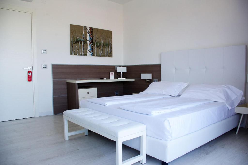 Postel nebo postele na pokoji v ubytování Grand Hotel Esplanada