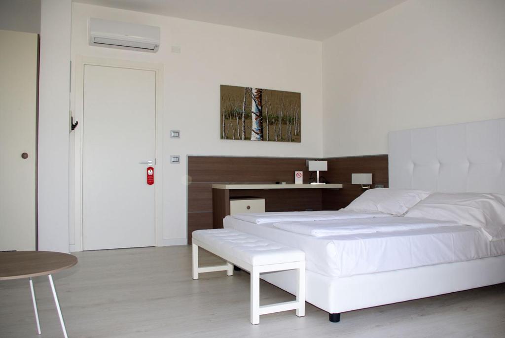 Postel nebo postele na pokoji v ubytování Grand Hotel Esplanada