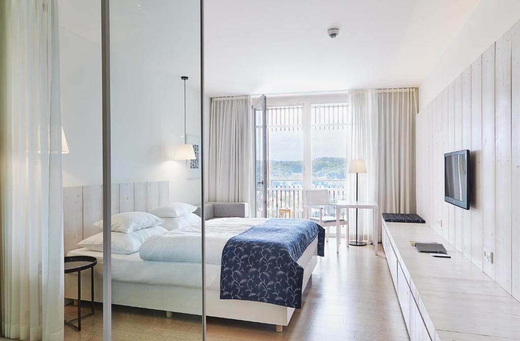 Posteľ alebo postele v izbe v ubytovaní LOISIUM Wine & Spa Hotel Südsteiermark