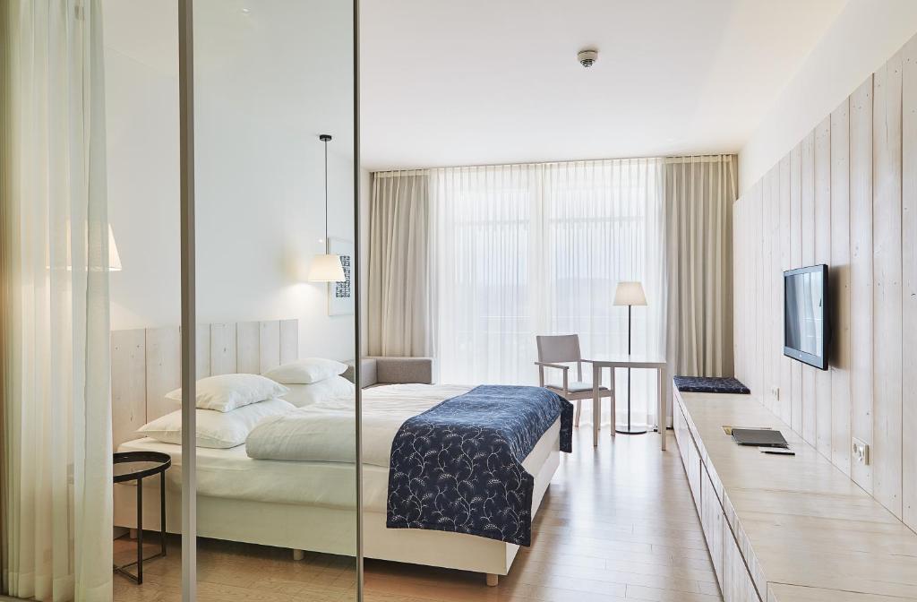 Posteľ alebo postele v izbe v ubytovaní LOISIUM Wine & Spa Hotel Südsteiermark