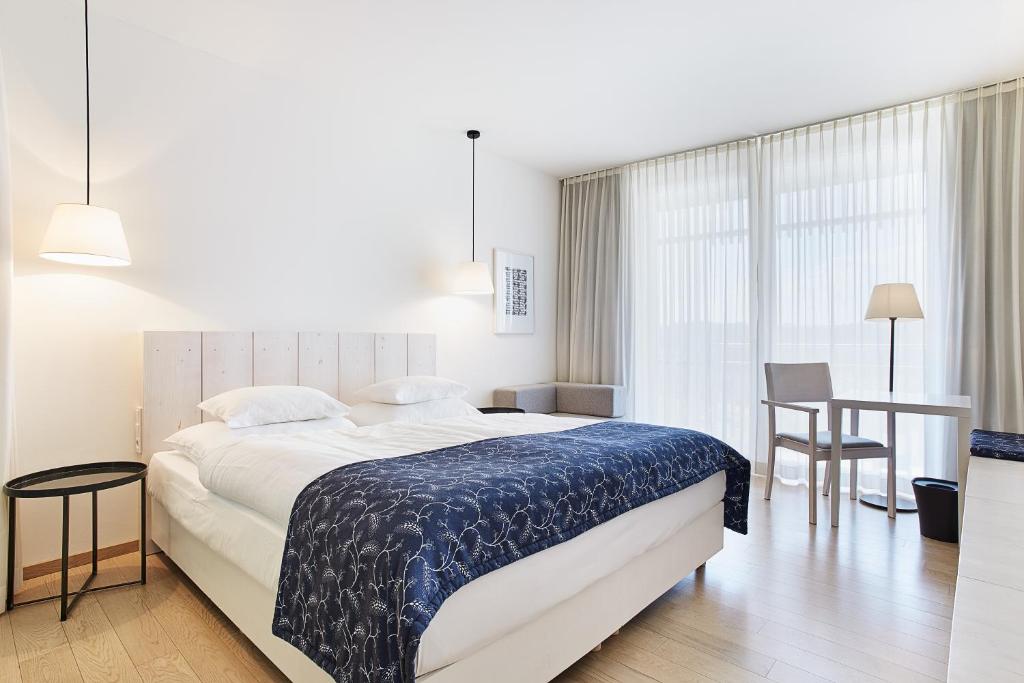 Posteľ alebo postele v izbe v ubytovaní LOISIUM Wine & Spa Hotel Südsteiermark
