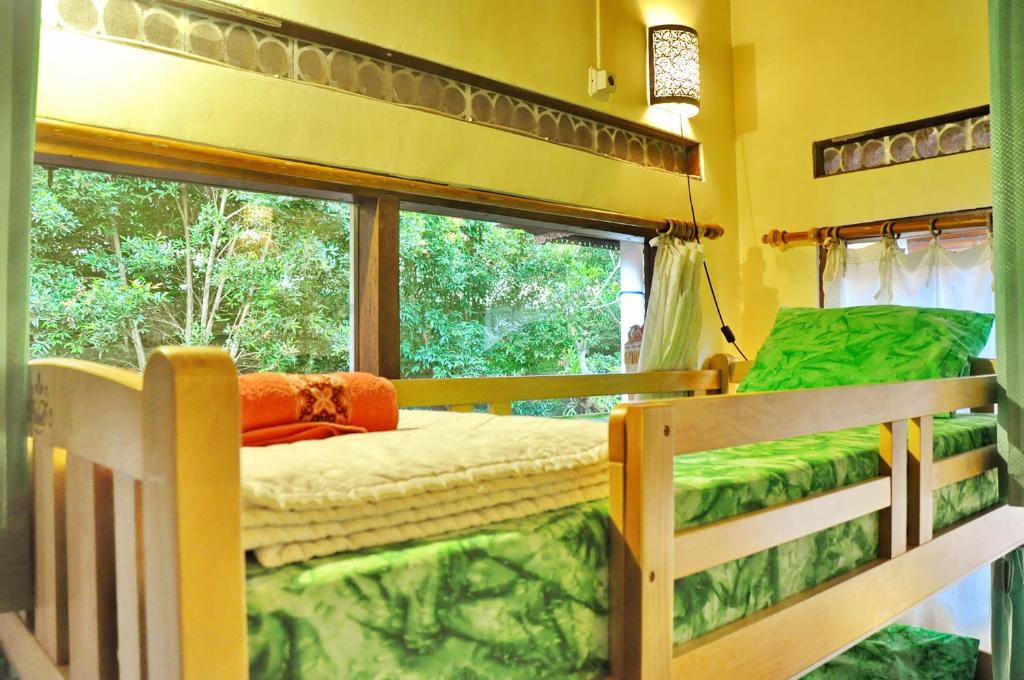 Postel nebo postele na pokoji v ubytování Soni Backpacker House