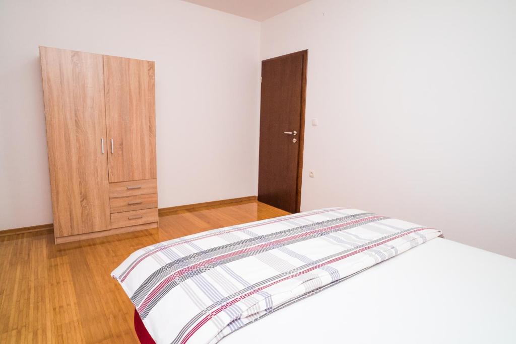 Posteľ alebo postele v izbe v ubytovaní Tina Rooms