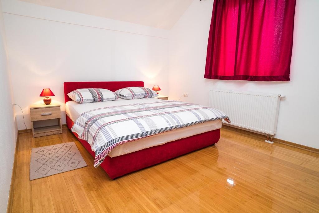 Posteľ alebo postele v izbe v ubytovaní Tina Rooms