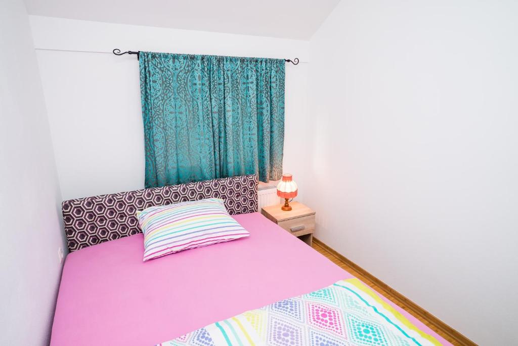 Posteľ alebo postele v izbe v ubytovaní Tina Rooms