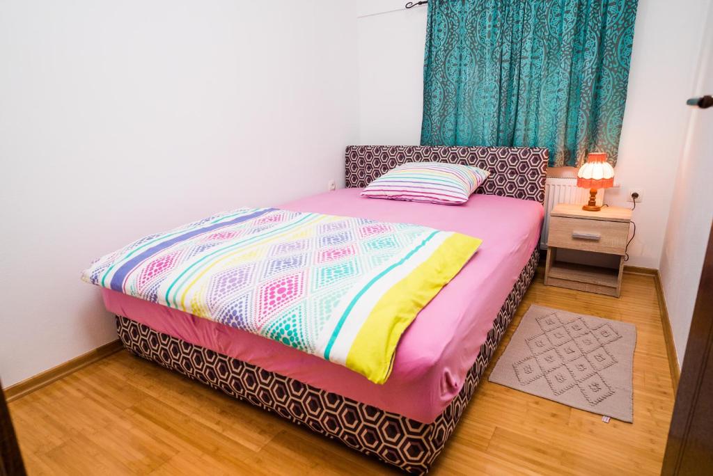 Posteľ alebo postele v izbe v ubytovaní Tina Rooms