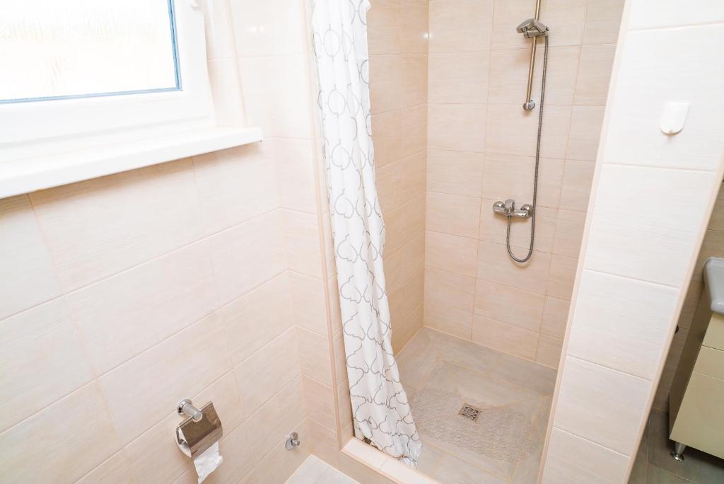Kúpeľňa v ubytovaní Tina Rooms