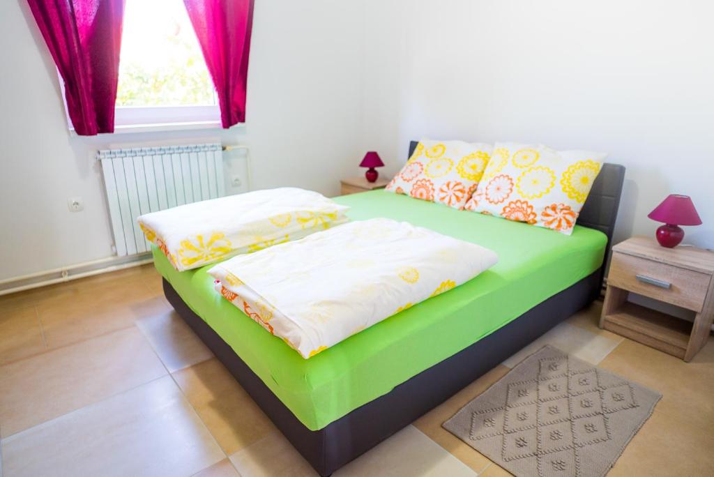 Posteľ alebo postele v izbe v ubytovaní Tina Rooms