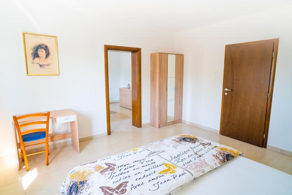 Posteľ alebo postele v izbe v ubytovaní Tina Rooms