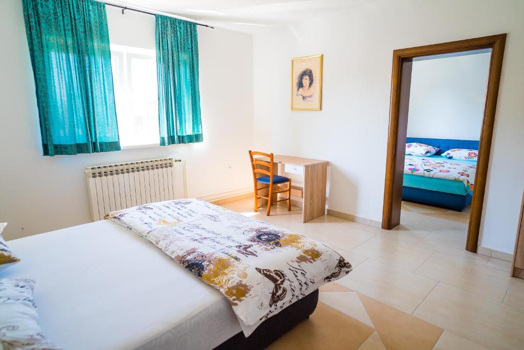 Posteľ alebo postele v izbe v ubytovaní Tina Rooms