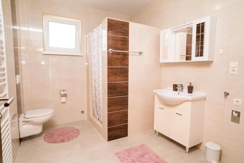 Kúpeľňa v ubytovaní Tina Rooms