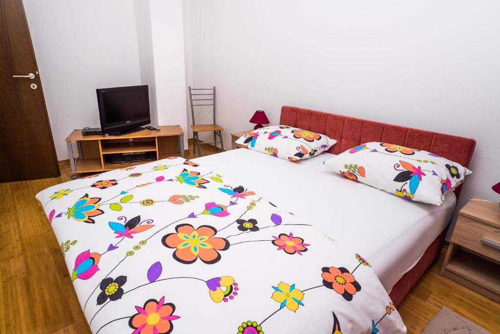 Posteľ alebo postele v izbe v ubytovaní Tina Rooms