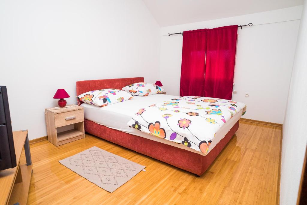 Posteľ alebo postele v izbe v ubytovaní Tina Rooms