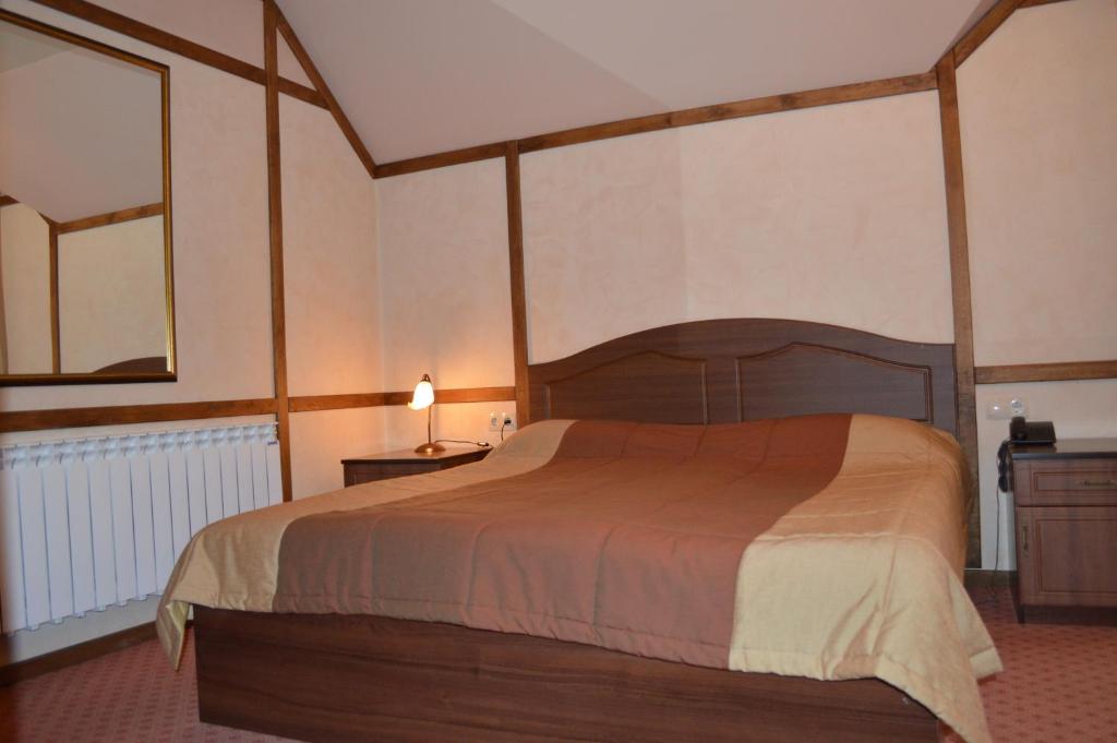 Postel nebo postele na pokoji v ubytování Hotel Complex Bahus