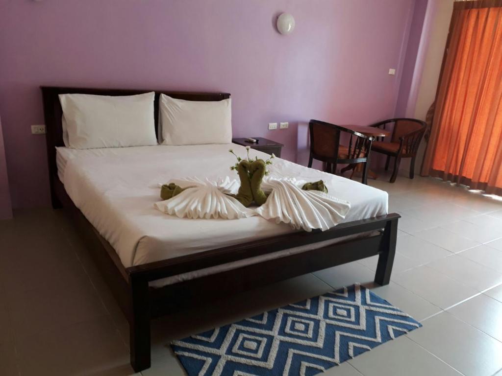Postel nebo postele na pokoji v ubytování Number 1 Guesthouse