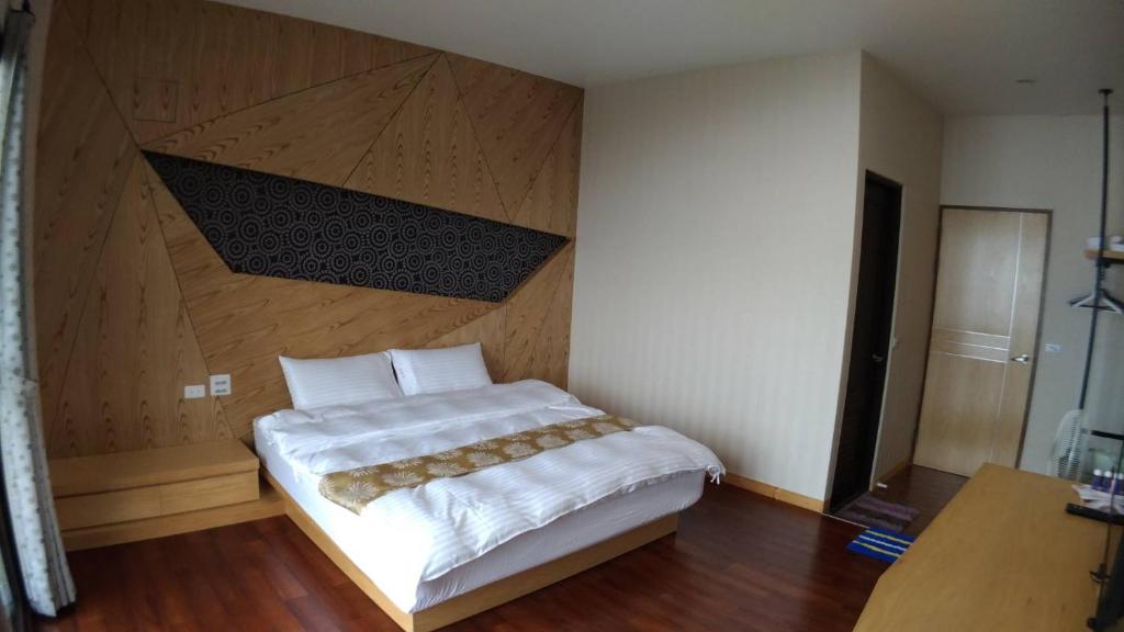 Postel nebo postele na pokoji v ubytování Shi Home 1639