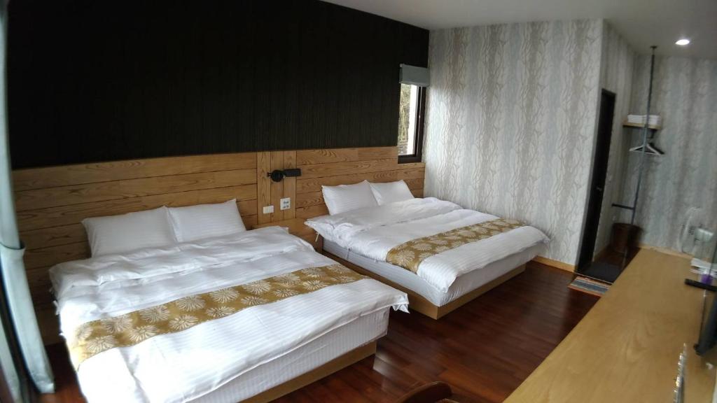 Postel nebo postele na pokoji v ubytování Shi Home 1639