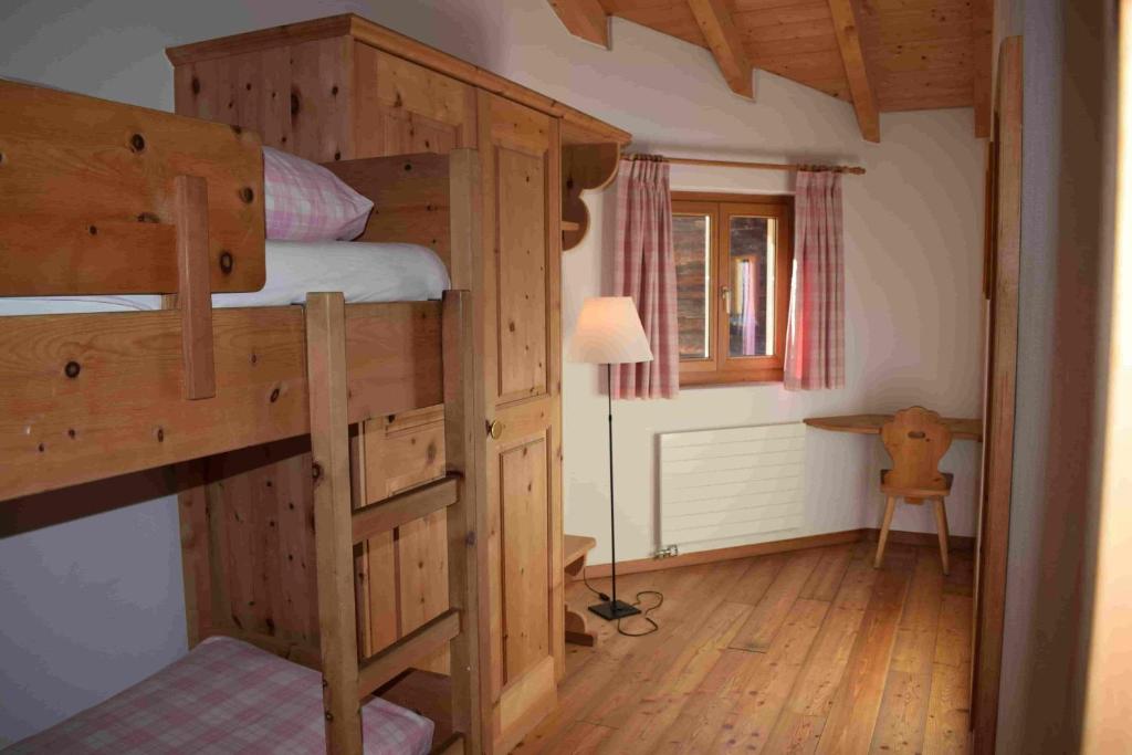 Postel nebo postele na pokoji v ubytování Residence Miragolf