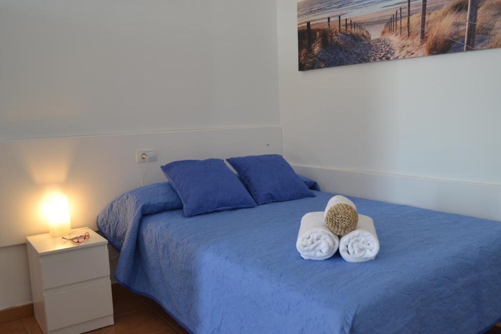 Posteľ alebo postele v izbe v ubytovaní Apartamento Vacacional con vistas al mar