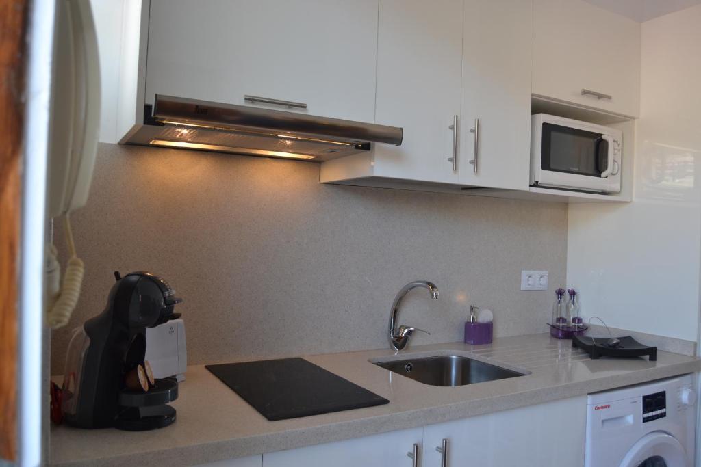 Kuchyňa alebo kuchynka v ubytovaní Apartamento Vacacional con vistas al mar