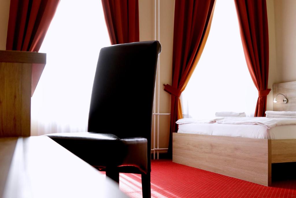Posteľ alebo postele v izbe v ubytovaní Hotel Stardust