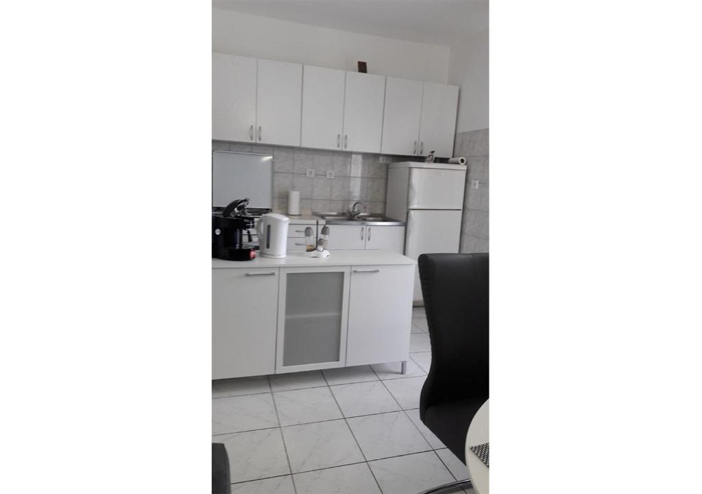 Kuchyň nebo kuchyňský kout v ubytování Apartments Stef