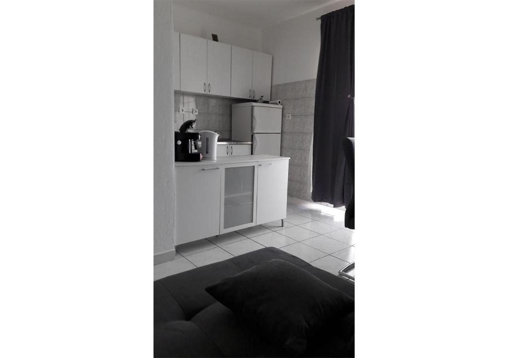 Kuchyň nebo kuchyňský kout v ubytování Apartments Stef
