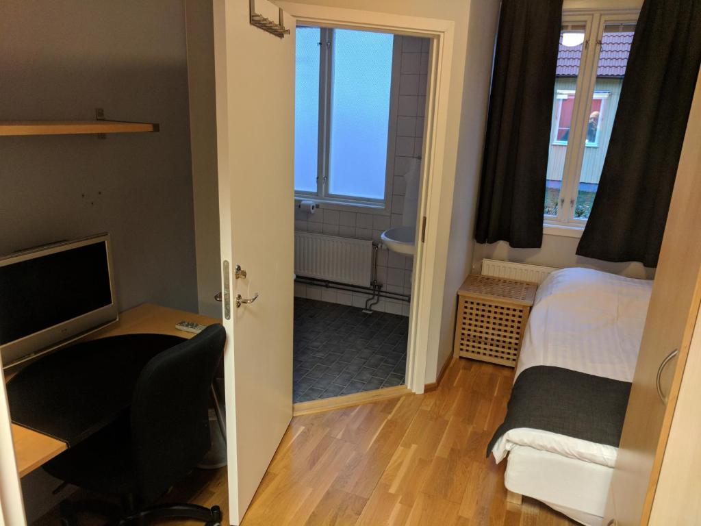 Postel nebo postele na pokoji v ubytování Hotell Hässlö