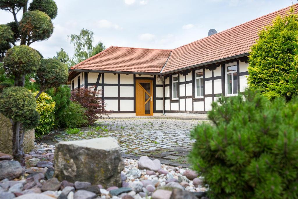 a house with a stone path in front of it at Ferienhaus-Pressler-Erfurt in Erfurt