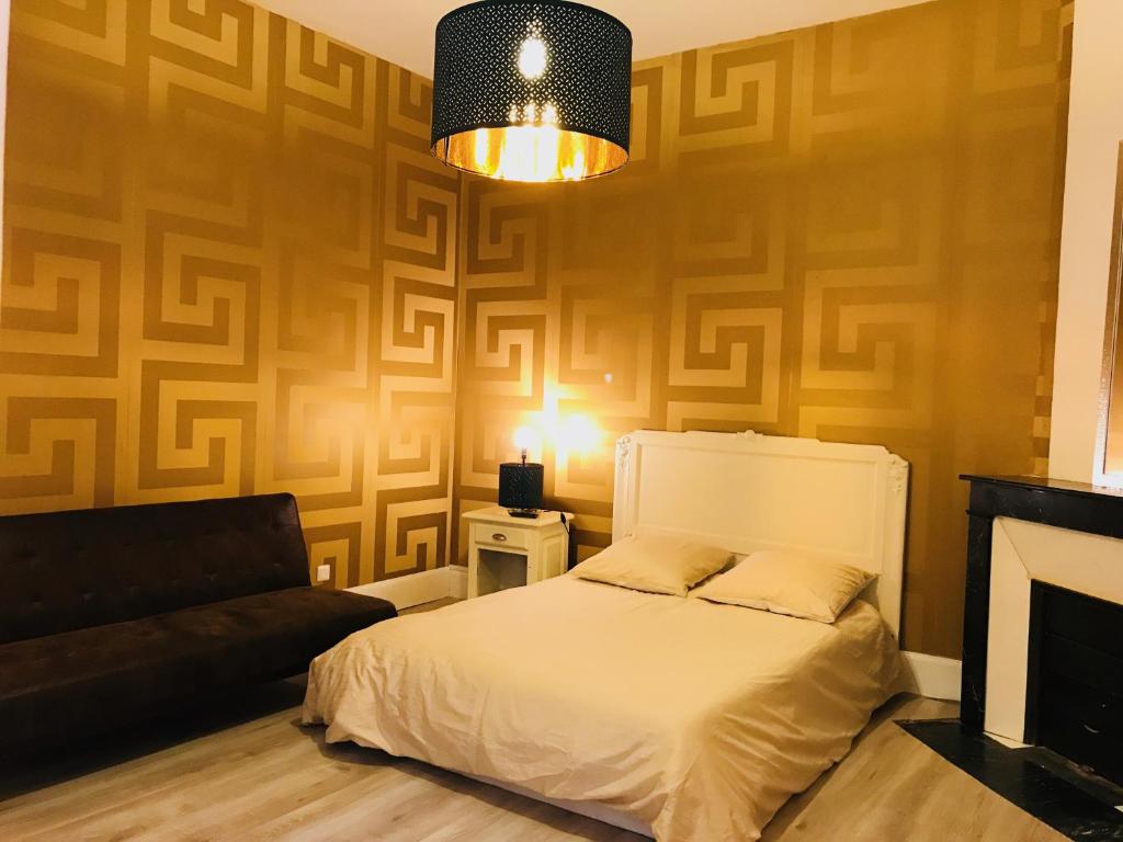Katil atau katil-katil dalam bilik di Luxury Suite Lilas 2