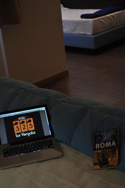 Postel nebo postele na pokoji v ubytování Hotel 325 Tor Vergata