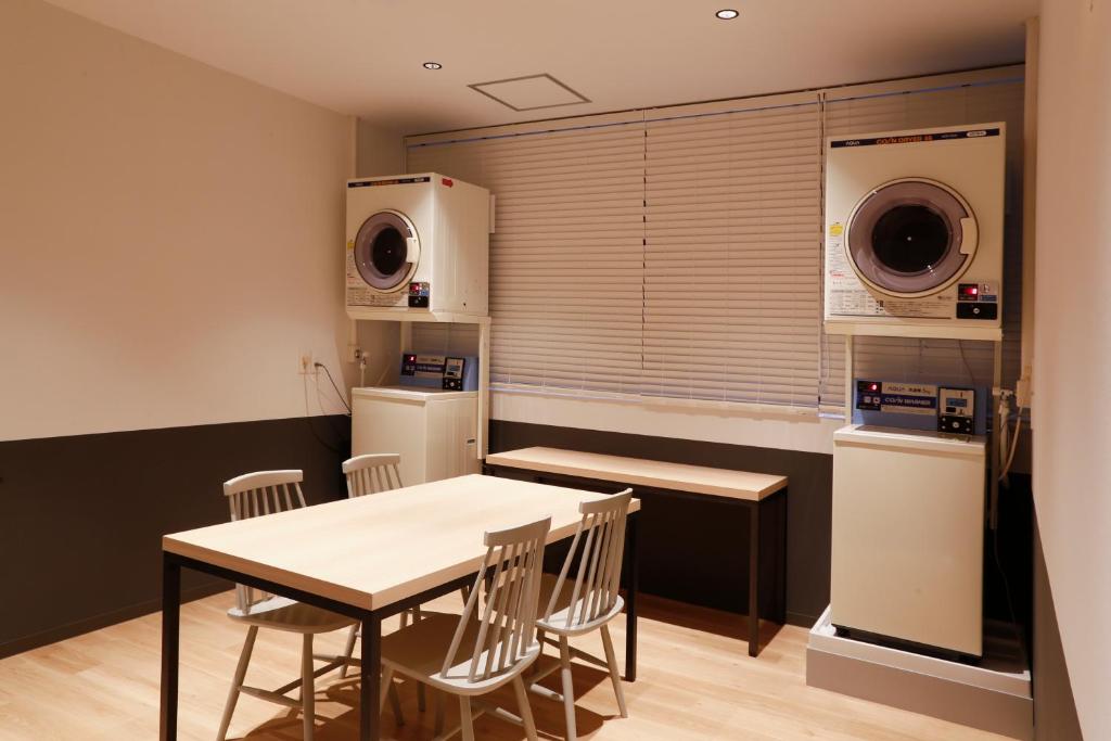 Kuchyň nebo kuchyňský kout v ubytování White Hostel Shinsaibashi